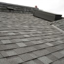 IKO Cambridge asphalt shingles in harvard slate colour installed on a main roof and around a multi-window dormer on flat roof section in Seaton Village, Toronto.